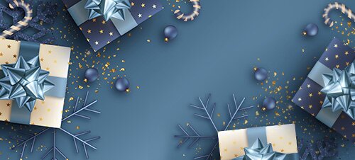 Geschenkkarte mit Geschenk-Symbolen und Auto mit Wohnwagen auf goldenem Hintergrund