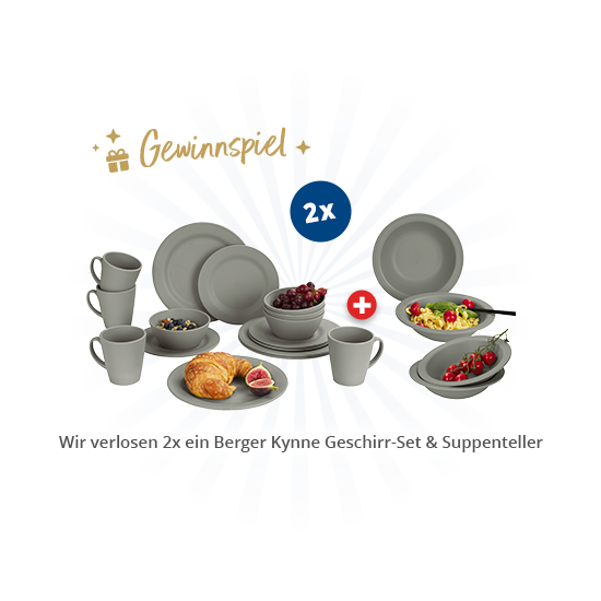 Mehrere graue Keramik-Geschirrteile (Teller, Suppenteller, Schalen, Tassen), ein Croissant und Schalen mit Obst auf blauem Strahlenhintergrund; goldener Schriftzug 'Gewinnspiel' mit Geschenk-Icon, weiße Zahl '2x' über dem Geschirr, weißes Banner mit